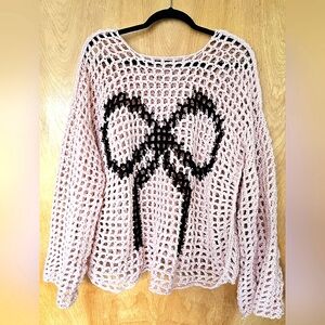 Pink Crochet Sweater with Black Bow Design